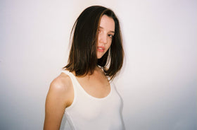 R+Co Atlantis applied to damp hair demonstrating detangling benefit