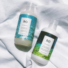 R+Co Atlantis natural ingredient display with rice bran and acai oils