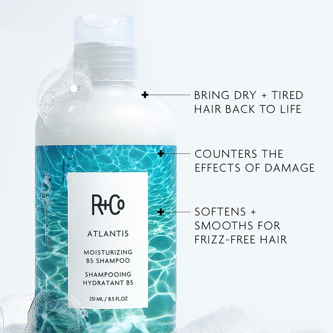 R+Co Atlantis label and pump detail highlighting clean design and ingredient focus
