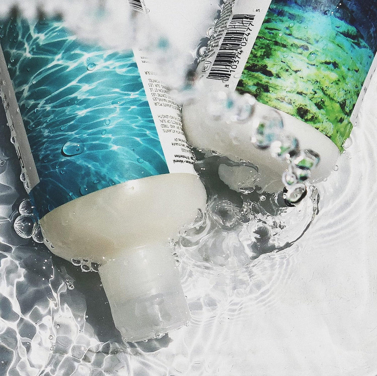 R+Co Atlantis creamy conditioner texture close-up showing moisturizing finish