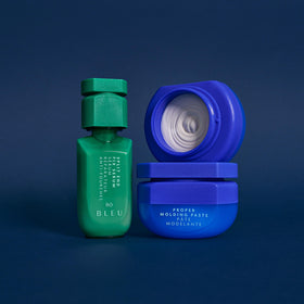 R+Co BLEU paste spread on hands demonstrating workable hold and smooth blendability
