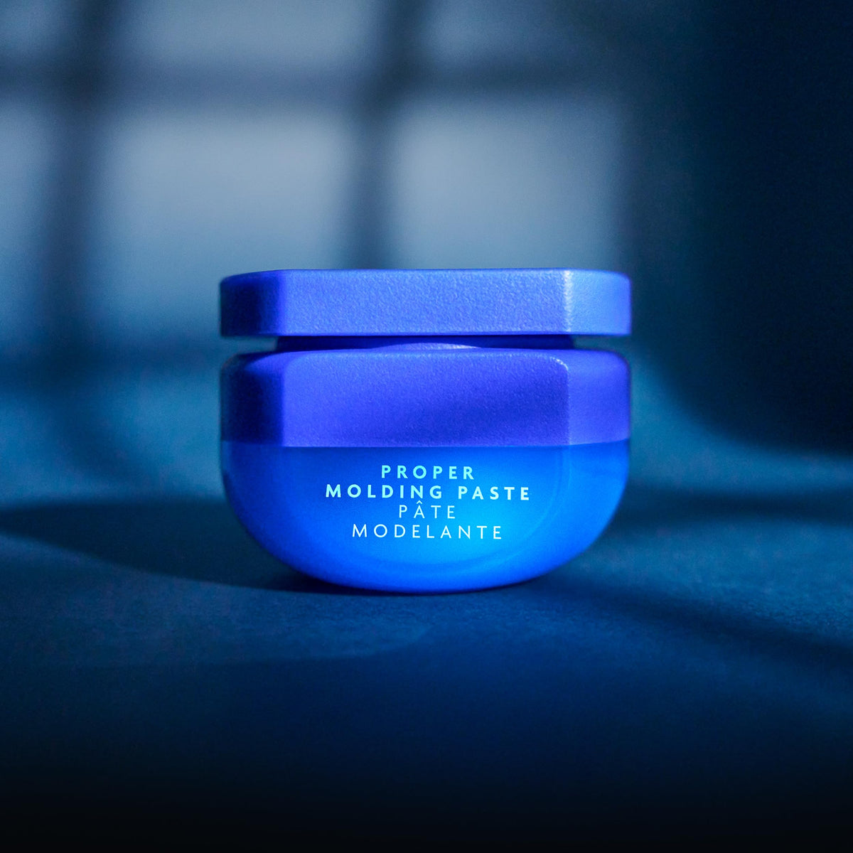 R+Co BLEU ingredient label close-up highlighting pea protein and plant extracts benefits