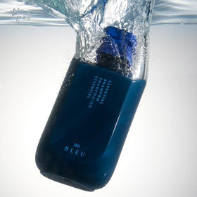 R+Co BLEU shampoo on shelf in bathroom lifestyle showing daily routine polish benefit