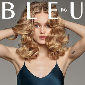 R+Co BLEU label close-up highlighting product name and ingredient focus