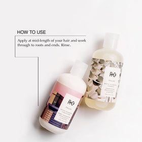 R+Co Dallas label close-up highlighting Dark Waves scent and clean formula benefits