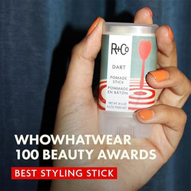 R+Co Dart Pomade Stick close-up texture showing smooth wax surface for controlled hold
