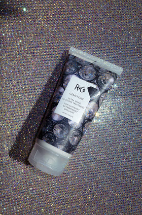 R+Co Gemstone applied in hand demonstrating smooth cream and simple styling benefit