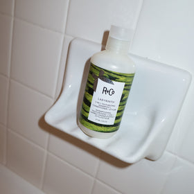R+Co Labyrinth creamy lather texture close-up showing gentle cleansing action