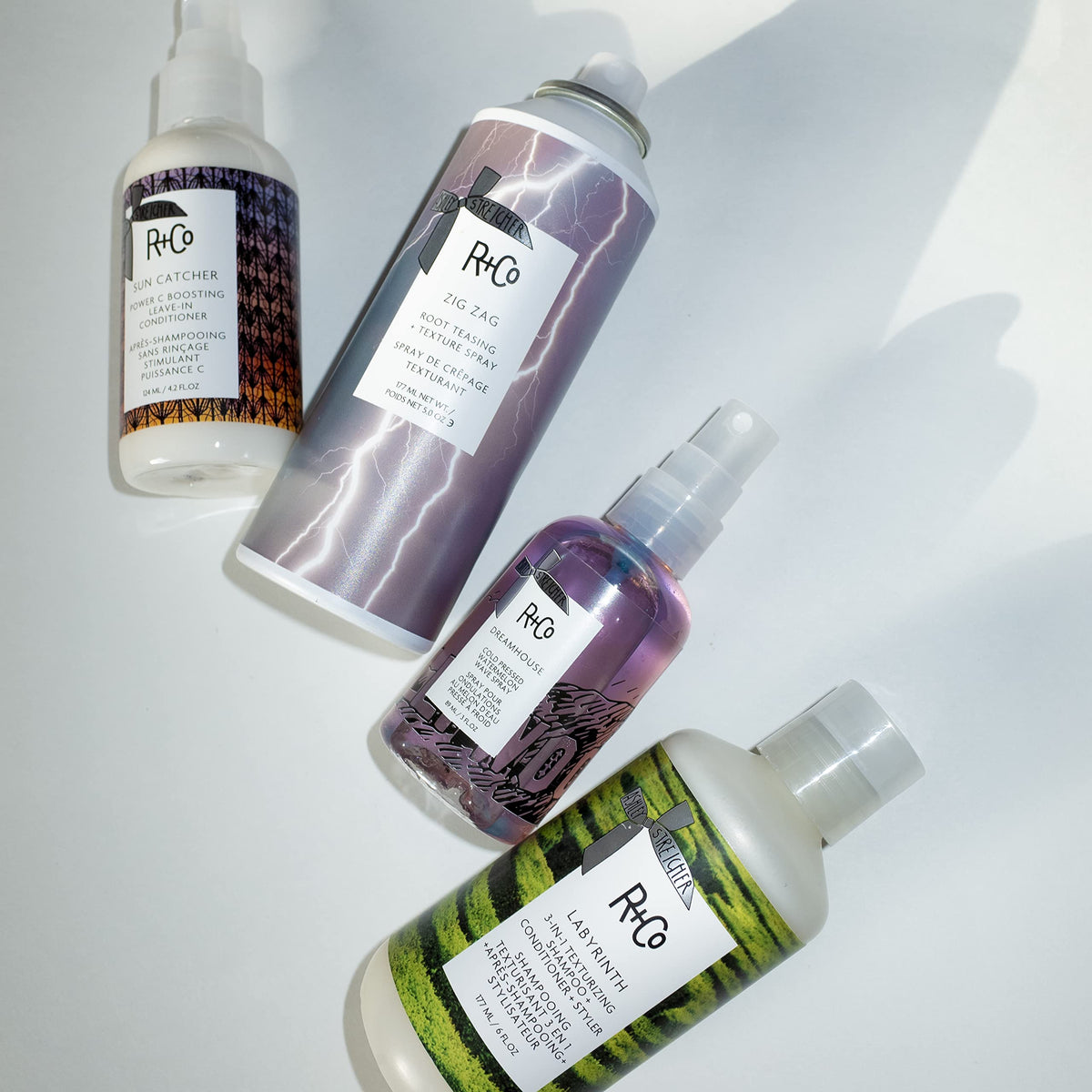 R+Co Labyrinth bottle in palm illustrating 6 oz travel-friendly size benefit
