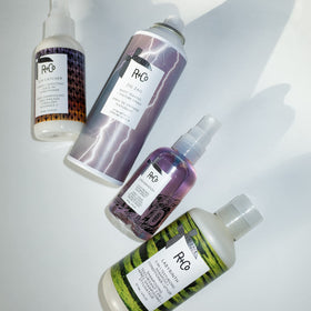 R+Co Labyrinth bottle in palm illustrating 6 oz travel-friendly size benefit