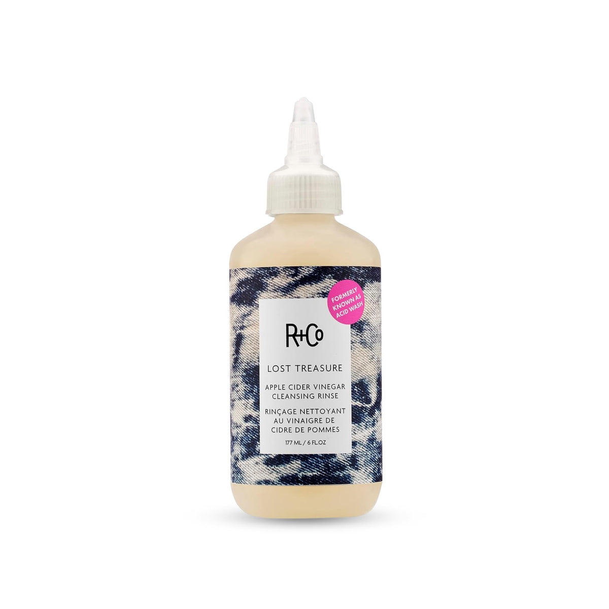 R+Co bottle front view showing product and clean packaging benefit