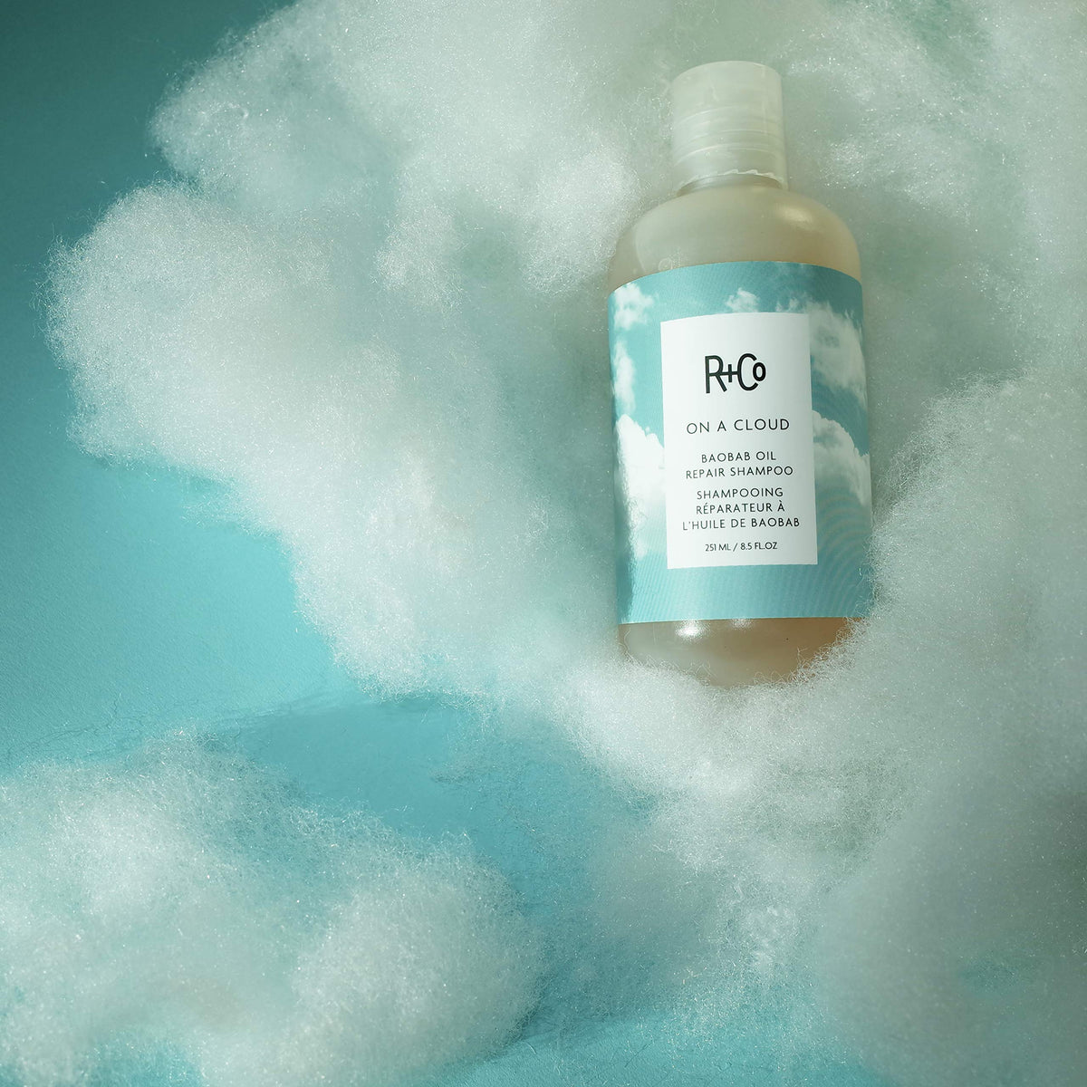 R+Co product label closeup highlighting repairing ingredients and benefits