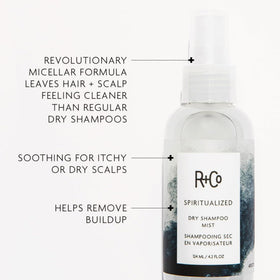Spray applying to scalp with fingertips demonstrating R+Co easy-refresh benefit