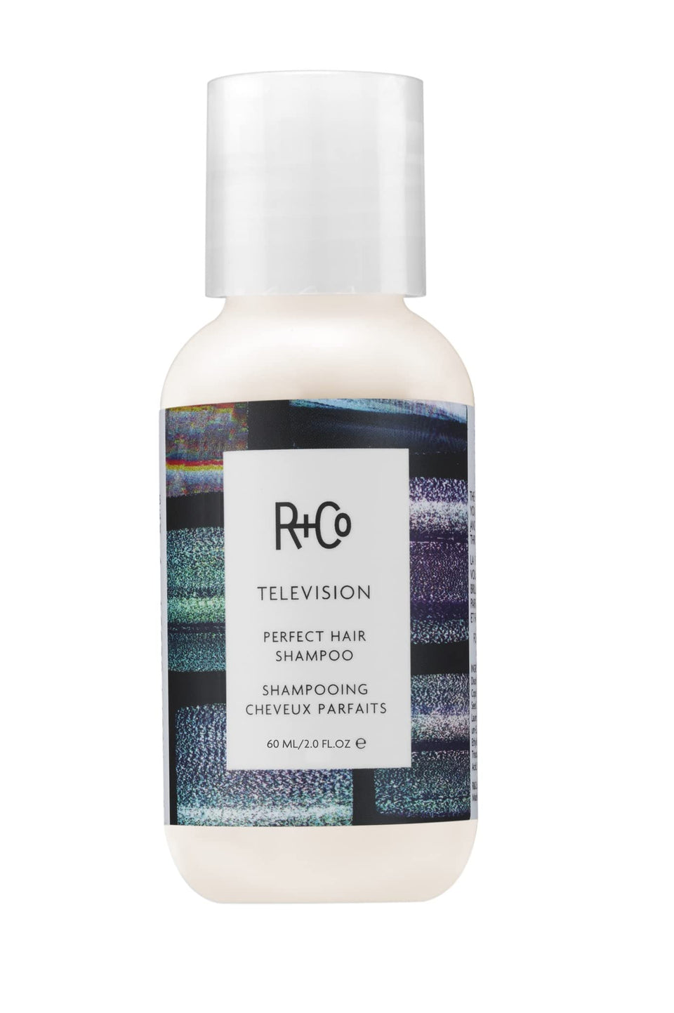 R+Co Television shampoo front view showing compact travel bottle and shine benefit