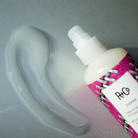 R+Co Zipper lotion texture close-up highlighting lightweight spreadability benefit