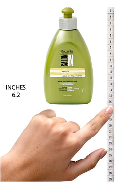Recamier held in hand for scale showing compact professional size