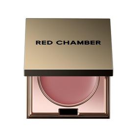 RED CHAMBER front compact showing sleek metallic case and branding, portable elegance