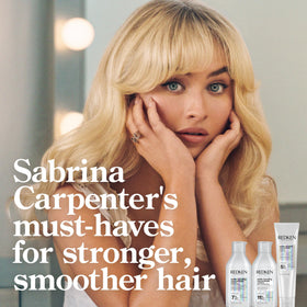 Redken back label ingredients view highlighting citric acid and bonding complex