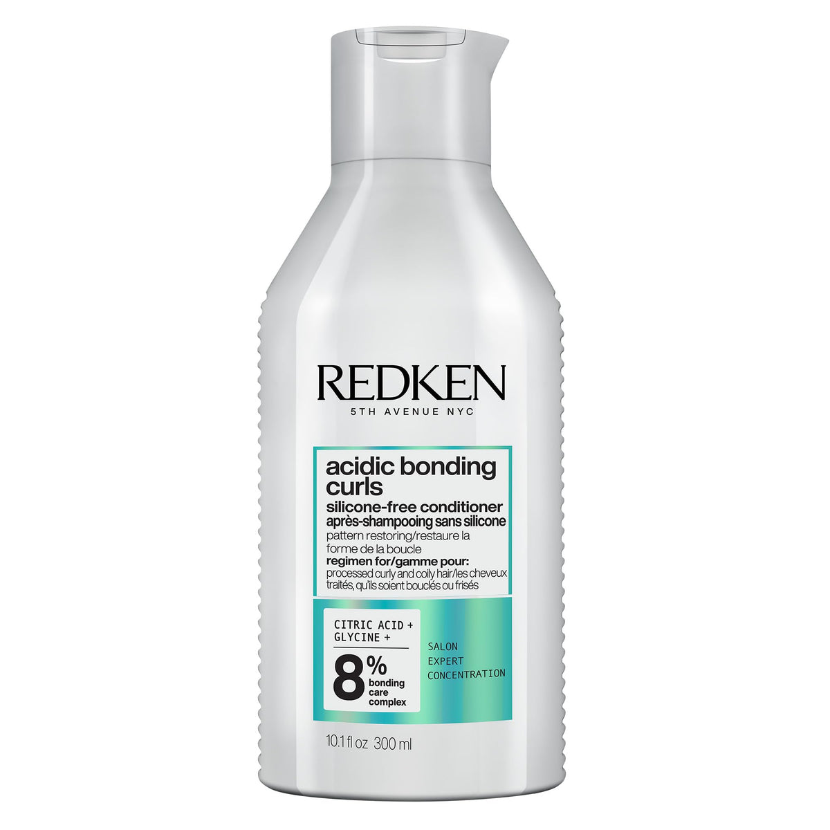Redken bottle front packaging showing product and curly hair benefit