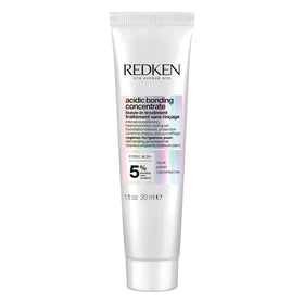 Redken bottle front packaging showing product and brand benefits