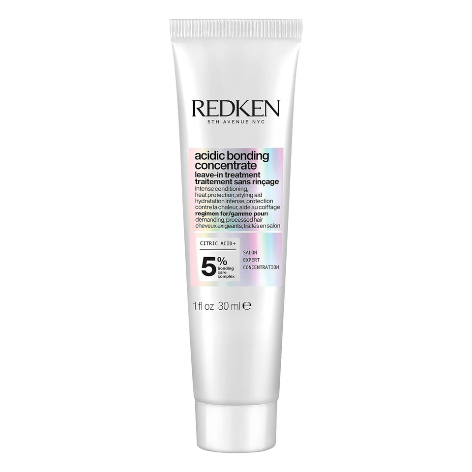 Redken bottle front packaging showing product and brand benefits