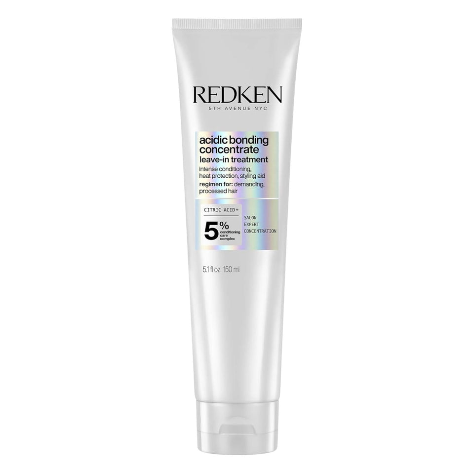 Redken front packaging showing product benefits and brand