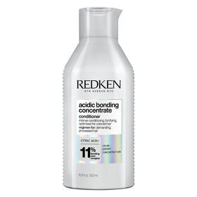 Redken front packaging showing bottle and label, professional repair visible