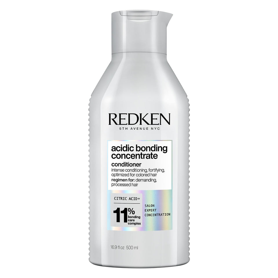 Redken front packaging showing bottle and label, professional repair visible