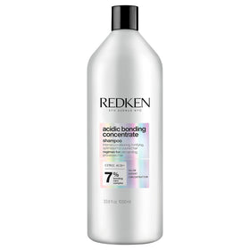 Redken bottle front label showing product name and size, clarifying purpose