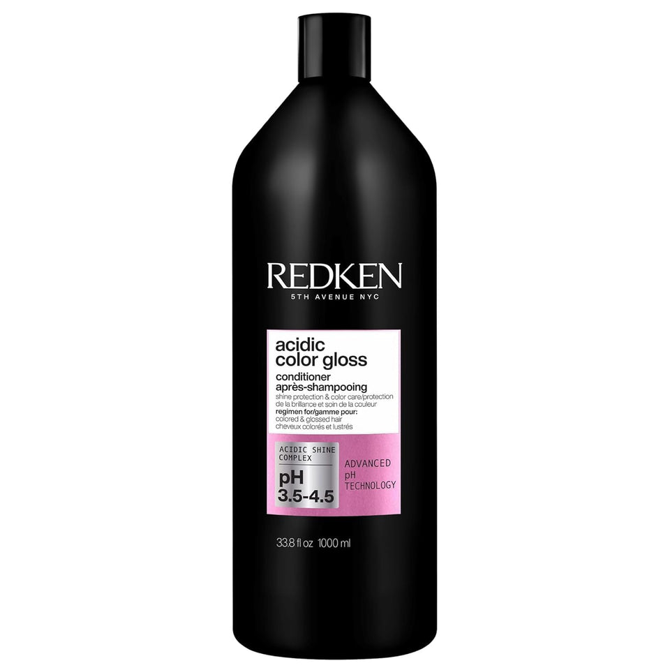 Redken bottle front view showing product and benefit of color protection