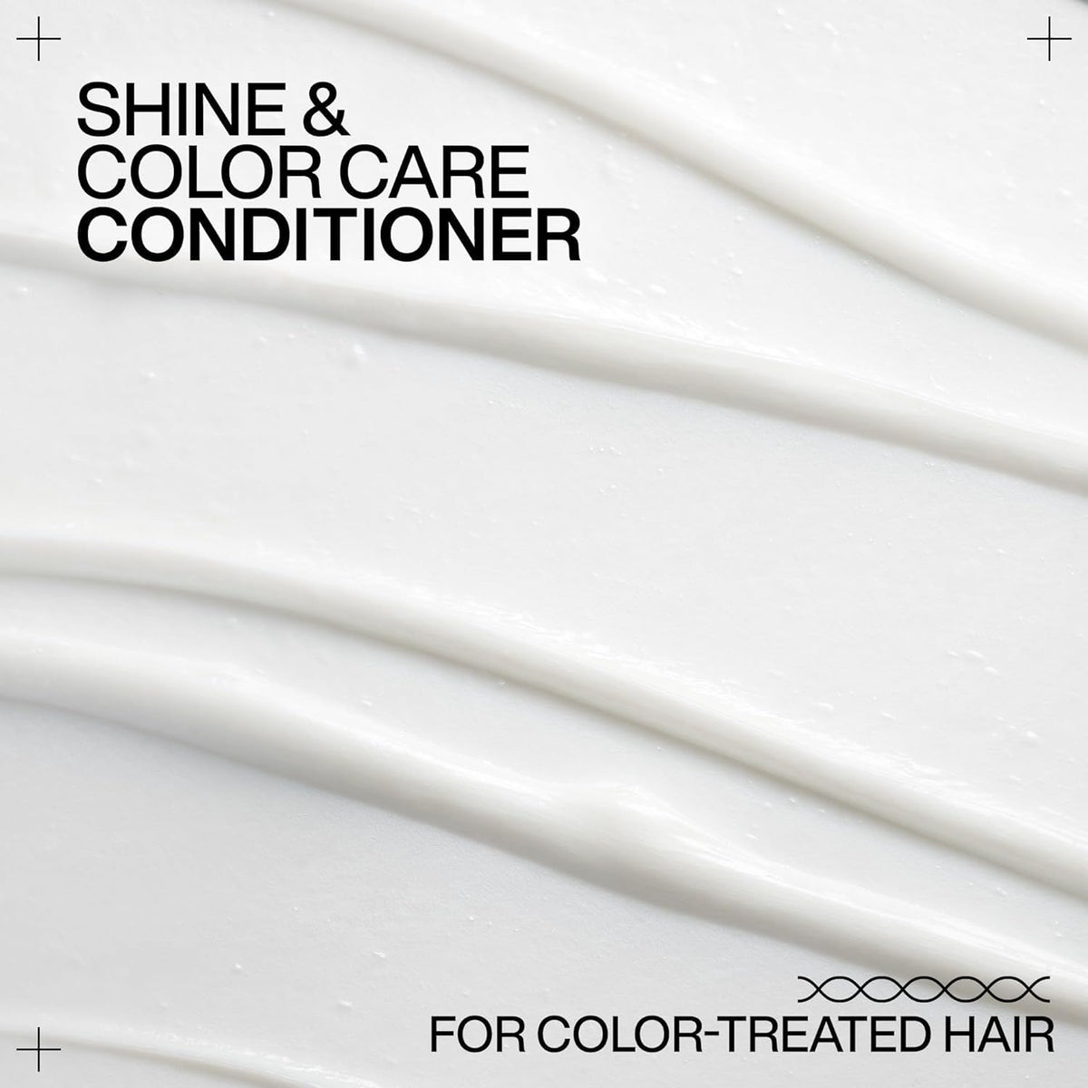 Model with glossy color-treated hair after using Redken for improved shine