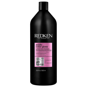 Redken front bottle view showing label and compact packaging for easy identification and shelf appeal
