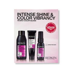 Redken front packaging showing mini kit and benefit of vibrant color retention