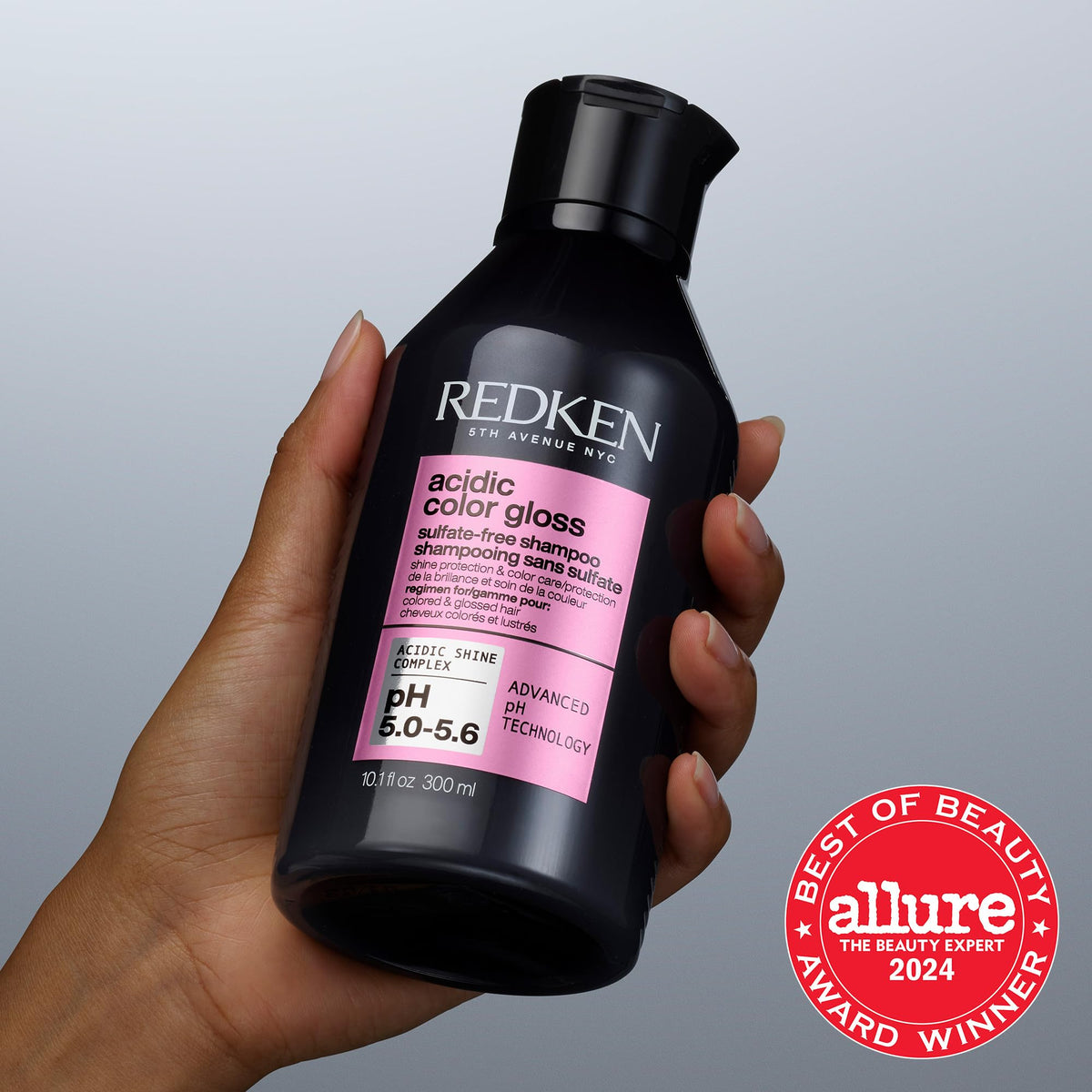 Redken styled hair after use showing high shine and vibrant color result