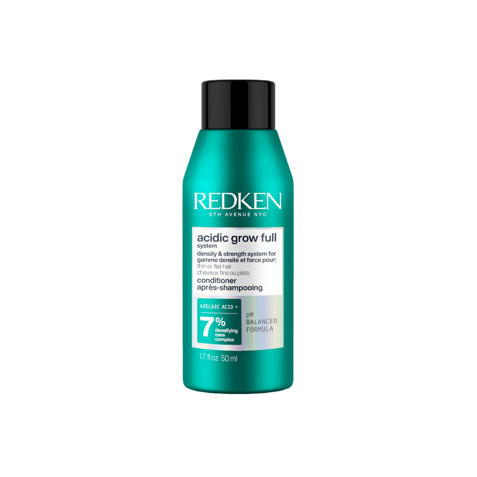 Redken bottle front packaging showing lightweight conditioner and system benefit