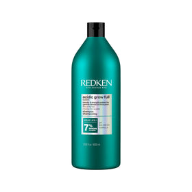 Redken bottle front view showing branding and benefit for fuller-looking hair