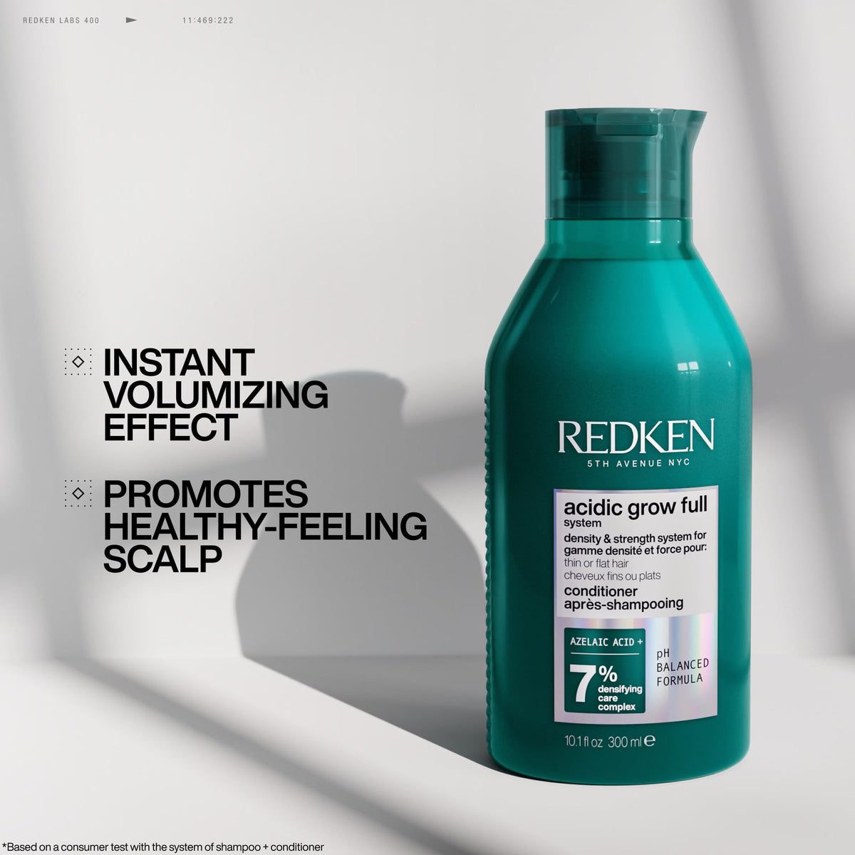 Redken dispensing a drop to show concentrated formula and efficient dosing