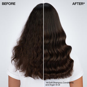Redken conditioner applied on hand demonstrating detangling benefit