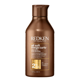 Redken front packaging showing product benefits and clean design