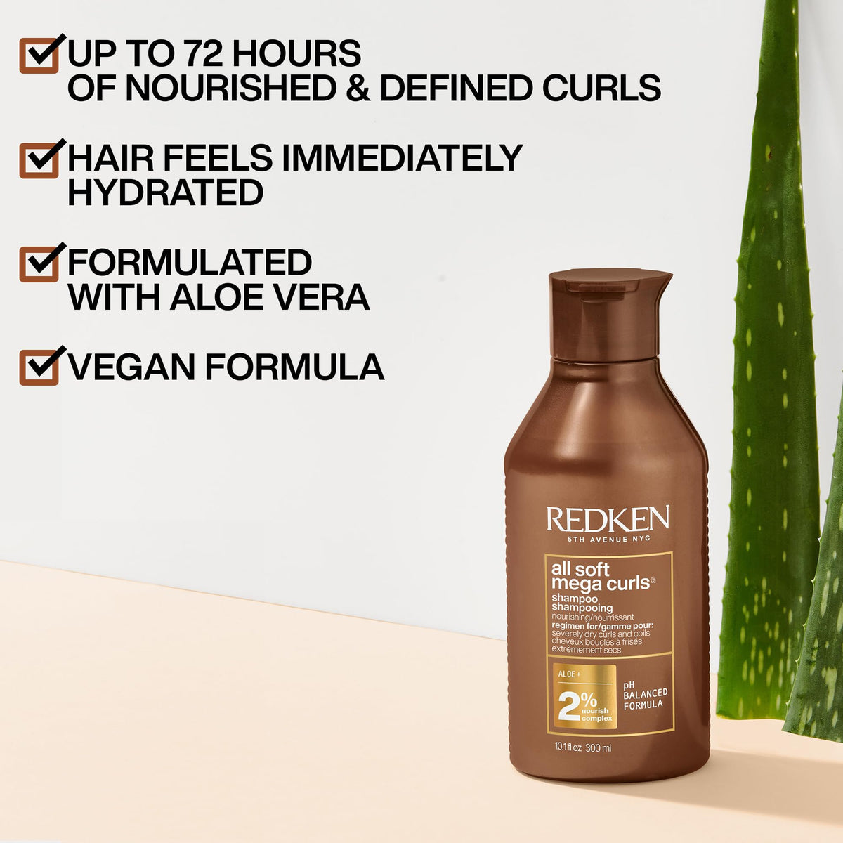 Redken lather texture close-up demonstrating gentle, creamy foam