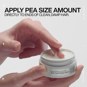 Redken bandage balm next to common items to display bottle size