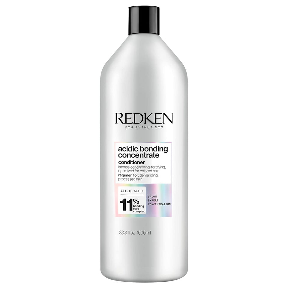 Redken front packaging shows product and repair focus