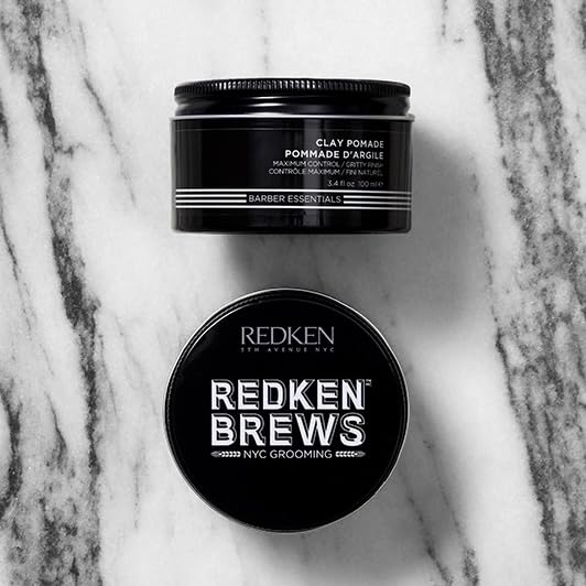 redken brews size comparison with ruler showing compact travel-friendly jar