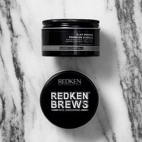 redken brews size comparison with ruler showing compact travel-friendly jar