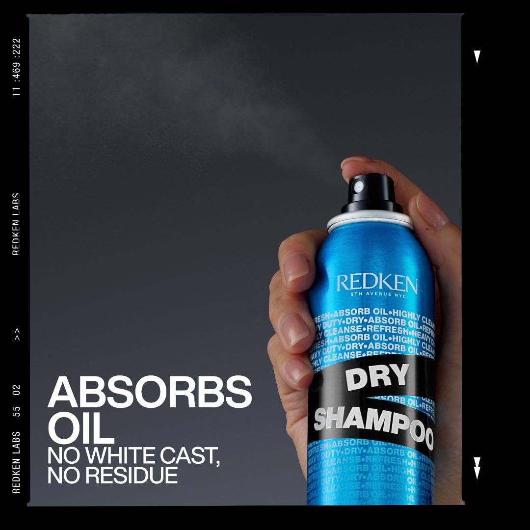 Redken jumbo size next to standard can to show extended usage and value