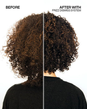 Redken in bathroom lifestyle scene suggesting salon-quality routine