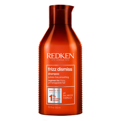 Redken bottle front view showing Frizz Dismiss shampoo for smooth hair