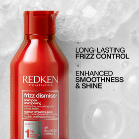 Redken label detail and pump cap highlighting product benefits