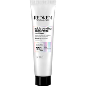 Redken front packaging bottle showing product and benefit of strengthening