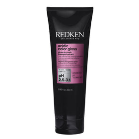 Redken front packaging highlighting product benefits and quick one-minute use
